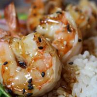 Shrimp Teriyaki · Grilled Shrimp with zests of lemon on top.