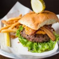 Merkt'S Cheddar Burger · 8 oz. burger topped with Merkt's cheddar cheese spread, balsamic charred red onions, Applewo...