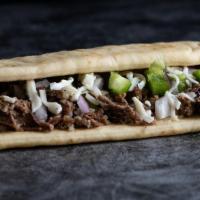 Philly Flatbread · Shredded beef, green peppers, red onions, mozzarella, & CE Spicy Ranch (CALS 358)
