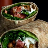 O.A.T. Wrap · Goat cheese, spinach, tomato, zucchini, roasted chickpeas, & CE Sweet Chili Sauce in a garli...