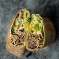 Grecian Wrap · Shredded beef, romaine, red onion, banana peppers, mozzarella, & CE Grecian Sauce in a whole...