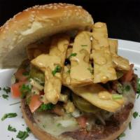 Tex-Mex Burger · Pepper jack cheese, salsa, jalapenos, crispy tortilla strips topped with a smokey chipotle a...