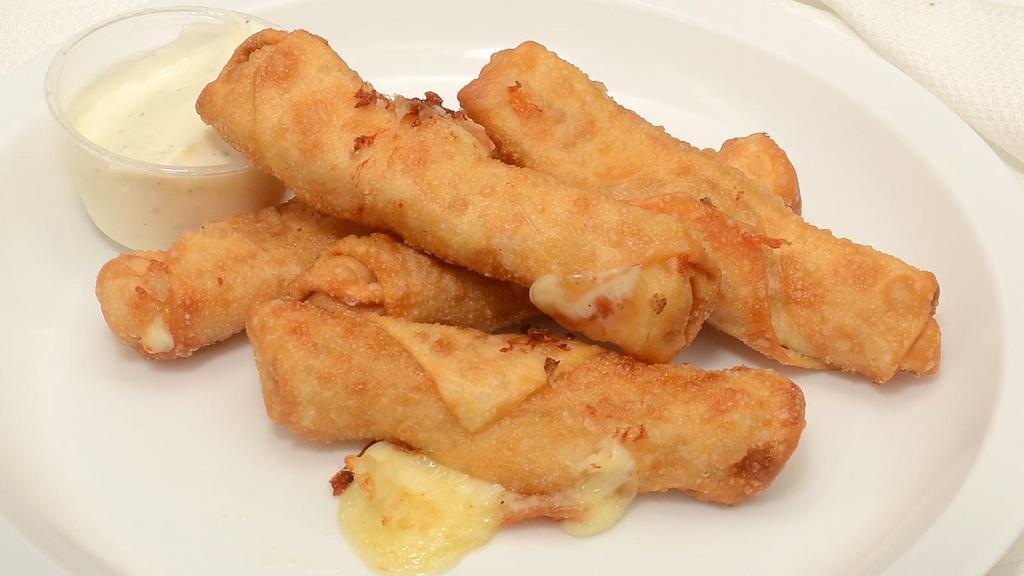 Bronx Cheese Sticks · Hand rolled mozzarella in wonton wrapper and fried to golden brown comes with one ranch dressing.
