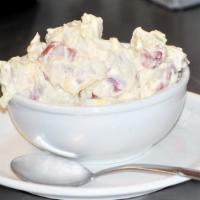 Red Skin Potato Salad · Cold dish made from seasoned poatoes.