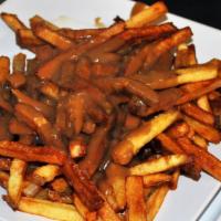 Fries With Gravy · Fried potatoes.