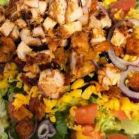 Santa Fe Salad · Romaine, grilled chicken breast, roasted corn, black beans, Roma tomatoes, red onions, chedd...