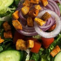 Tossed Salad · Romaine, Roma tomatoes, red onions, English cucumbers, and croutons.