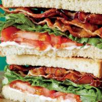 Blt · Crispy bacon, lettuce, Roma tomatoes, and mayo served on toasted white.