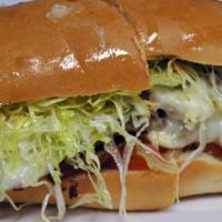 Cheesesteak Hoagie · Grilled steak, green peppers and onions, melted provolone, lettuce, tomatoes, and Marc’s Ita...