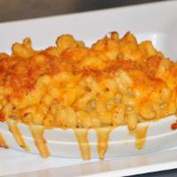 Baked Mac 'N' Cheese · Lightly baked extra-large portion of macaroni with house-made Wisconsin cheddar cheese sauce...