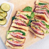 Keko’S Club Sandwich · Triple decker on white or wheat toast, with ham, bacon, turkey, lettuce, tomatoes, and Ameri...