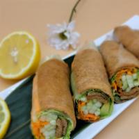 Tofu Spring Roll · Rice paper, fried tofu, avocado, cucumber, carrot and lettuce.