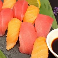 Nigiri Combo · 4 pieces of tuna nigiri and 4 pieces of antibiotics free salmon nigiri. Include: natural gin...