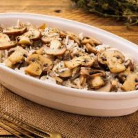 Mushroom Rice Platter · Long grain rice with fresh mushrooms, a farmer's salad, pita bread, and a choice of dip.