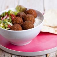 Falafel Hummus Bowl Combo · Hummus bowl with seasoned falafel, farmer's salad and a pita bread. Served with a side of fr...
