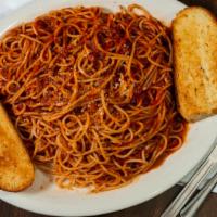 Spaghetti · Long thin solid ropes of pasta. Includes: an order of focaccia bread.