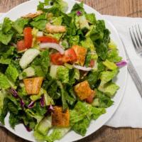 Fattoush Salad (Large) · Fresh romaine lettuce, tomato, onion, cucumber, parsley, and toasted pita chips tossed with ...