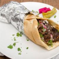 Beef Shawarma (A La Carte) · Hand-cut marinated angus beef strips, topped with sauteed tomatoes, sauteed onion, pickled t...