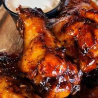Wood-Fired Wings · 1 lb Grilled Chicken Wings. Choose your flavor: Naked, Chipotle BBQ, or Diablo.