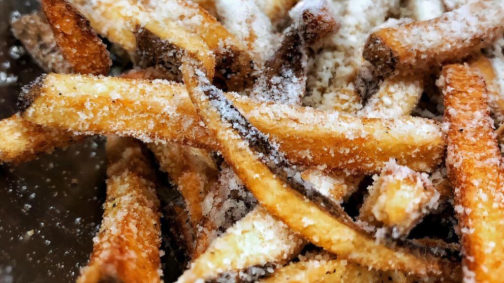 Truffle Parmesan Fries · Fresh Hand-Cut Fries Tossed in Authentic Truffle Oil and Sprinkled with Parmesan Cheese. 100% Free of Artificial Trans-Fats and Fried in a Hypoallergenic Oil Blend