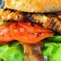 Salmon Blt · Grilled West Coast Salmon, Applewood Smoked Bacon, Lettuce, Tomato, and drizzled with Garlic...