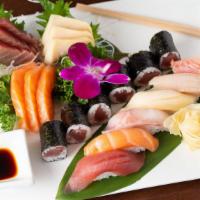 Sushi & Sashimi Combo · Six pcs of nigiri sushi and eight pcs sashimi with tuna roll. Raw.