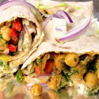 Chickpea Kati Roll · Indian street food version of the burrito. Chickpeas rolled in flat-bread and fresh veggies ...