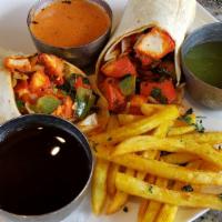 Vegetable Kati Roll · Indian street food version of the burrito. Mixed Vegetables rolled in flat-bread with fresh ...