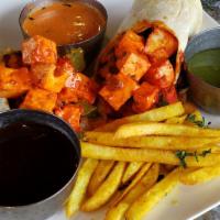Paneer Signature Kati Roll · Indian street food version of the burrito. Cheese cubes rolled in flat-bread with Chopped Bo...