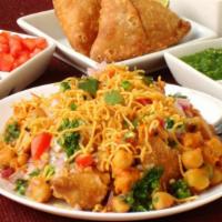 Samosa Chaat · Samosa Chaat is a delicious Indian street food where crispy Vegetable Samosa is topped with ...