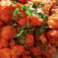 Manchurian · Manchurian is a popular battered deep fried medium spicy Chicken-Paneer-Cauliflower appetize...