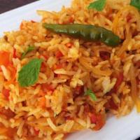 Tomato Rice (Vegan) · Basmati rice with fresh tomato and tempering spices.