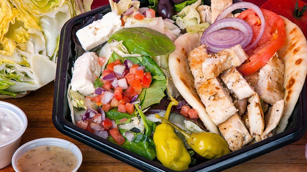 Pita Dinner · Choose between Gyro or Chicken. Dinners include  fries or greek salad comes with feta, olives & pepperoncini’s. (Chicken Pita Dinner with Greek Salad in picture)