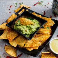 Chips & Guacamole · Chips with freshly made guacamole.