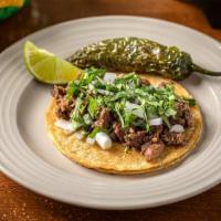 Steak (Asada) Taco · American Style: Lettuce & Tomato or Mexican Style: Onion & Cilantro.  Add extra toppings and...