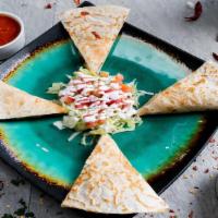 Quesadilla (Barbacoa) · Flour tortilla with grilled Barbacoa. Served with a melted cheese.