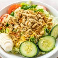 Grilled Chicken Salad  · Crispy chicken, lettuce, tomatoes, onions,  cucumbers, egg and cheddar cheese (with pita).
