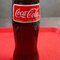 Mexican Coke · Mexican Coke glass bottle.