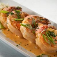 Barbecued Shrimp · large shrimp sautéed in reduced white wine, butter, garlic & spices. 860 cal.