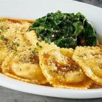 Veal Osso Buco Ravioli · saffron-infused pasta with sautéed baby spinach & white wine demi-glace. 460 cal.
