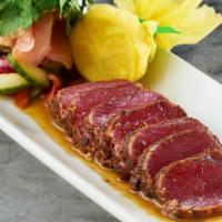 Seared Ahi Tuna* · complemented by a spirited sauce with hints of mustard & beer. 130 cal.
**Disclaimer: Served...