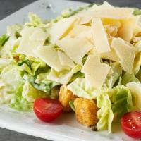Caesar Salad* · fresh romaine hearts, romano cheese, creamy caesar dressing, shaved parmesan & fresh ground ...