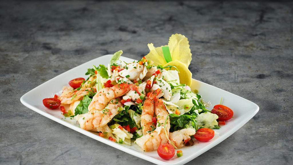Chilled Shellfish Salad · shrimp & lump crabmeat tossed with vinaigrette dressing on a bed of mixed greens. 490 cal.