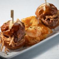 Filet Sliders* · two filet sliders topped with Ruth's barbecue butter & crispy onion straws, served with hous...