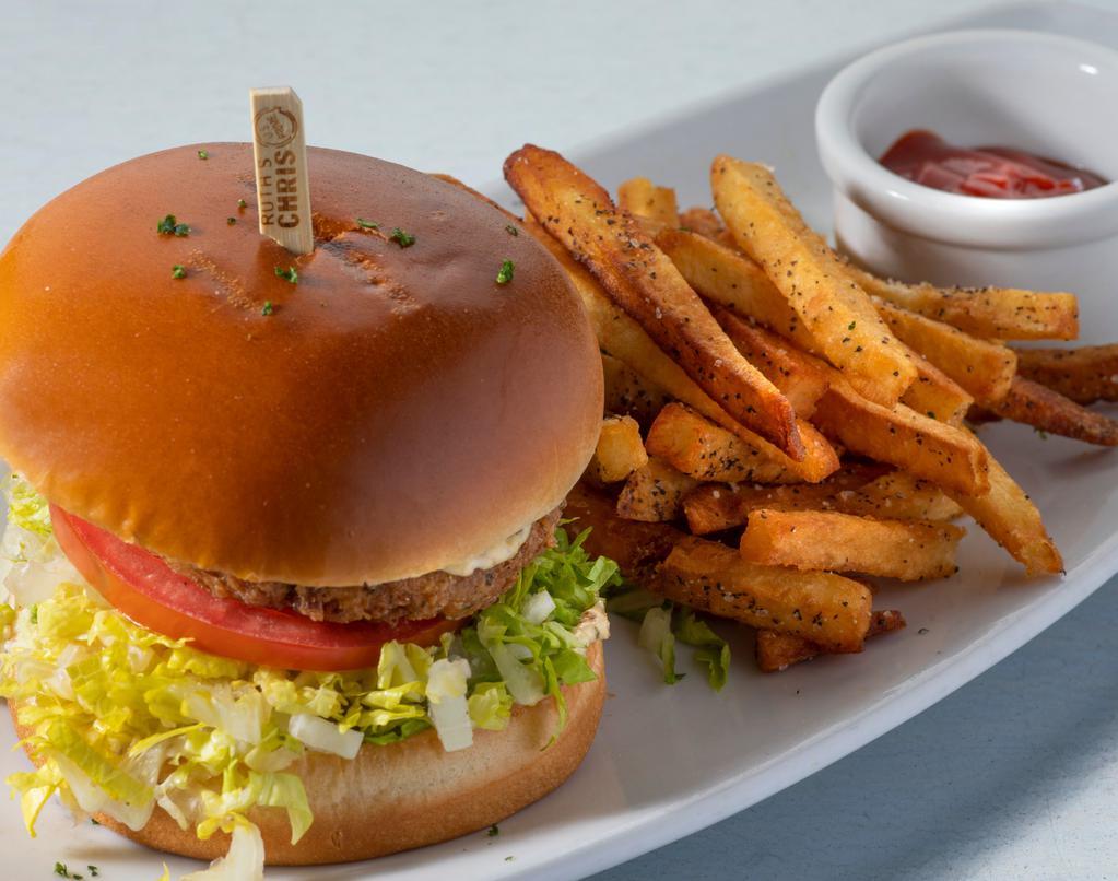 Crab Cake Sandwich · crab cake topped with remoulade sauce, served with lettuce, tomato, & onion and hand-cut french fries. 1250 cal.