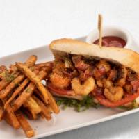 Shrimp Po' Boy · fried shrimp, lettuce, tomato, & remoulade sauce, served with hand-cut french fries. 1640 cal.