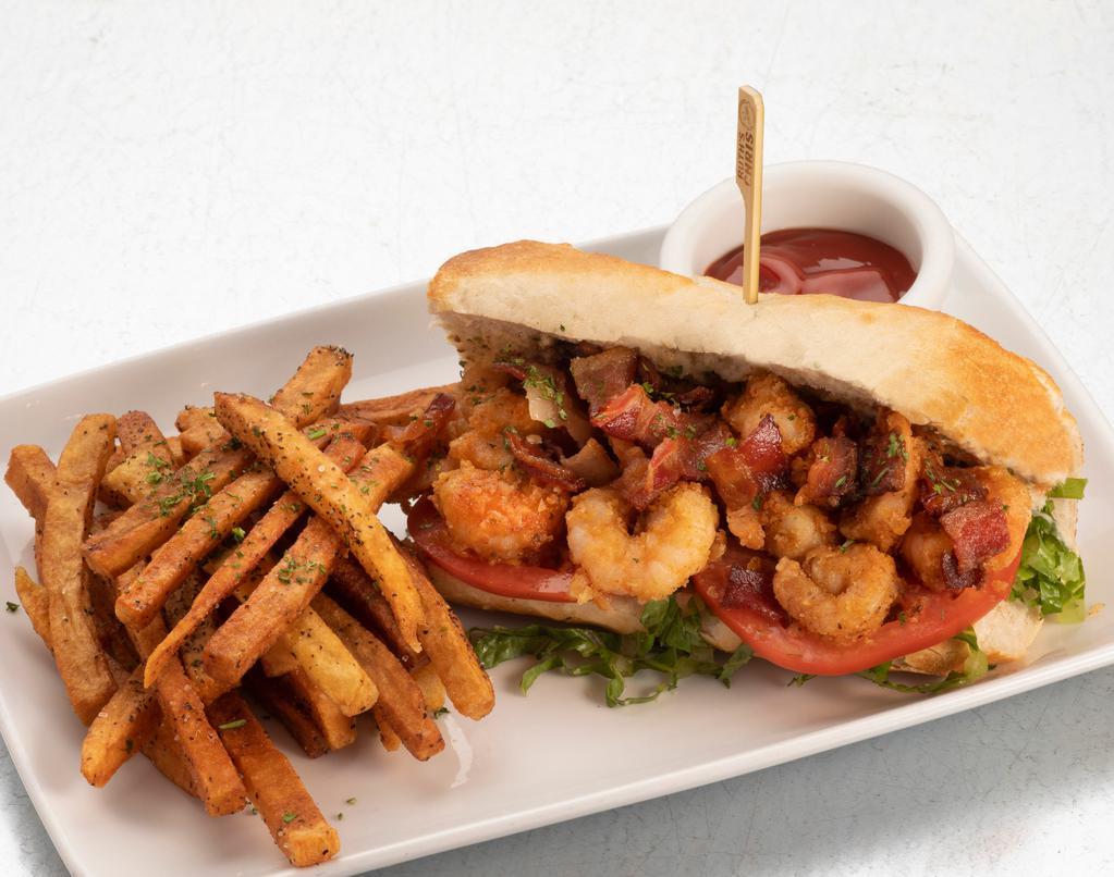 Shrimp Po' Boy · fried shrimp, lettuce, tomato, & remoulade sauce, served with hand-cut french fries. 1640 cal.