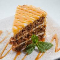 Carrot Cake · Three towering layers of our own special recipe with thick, velvety cream cheese icing, driz...