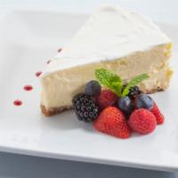 Cheesecake · Creamy homemade cheesecake served with fresh berries.