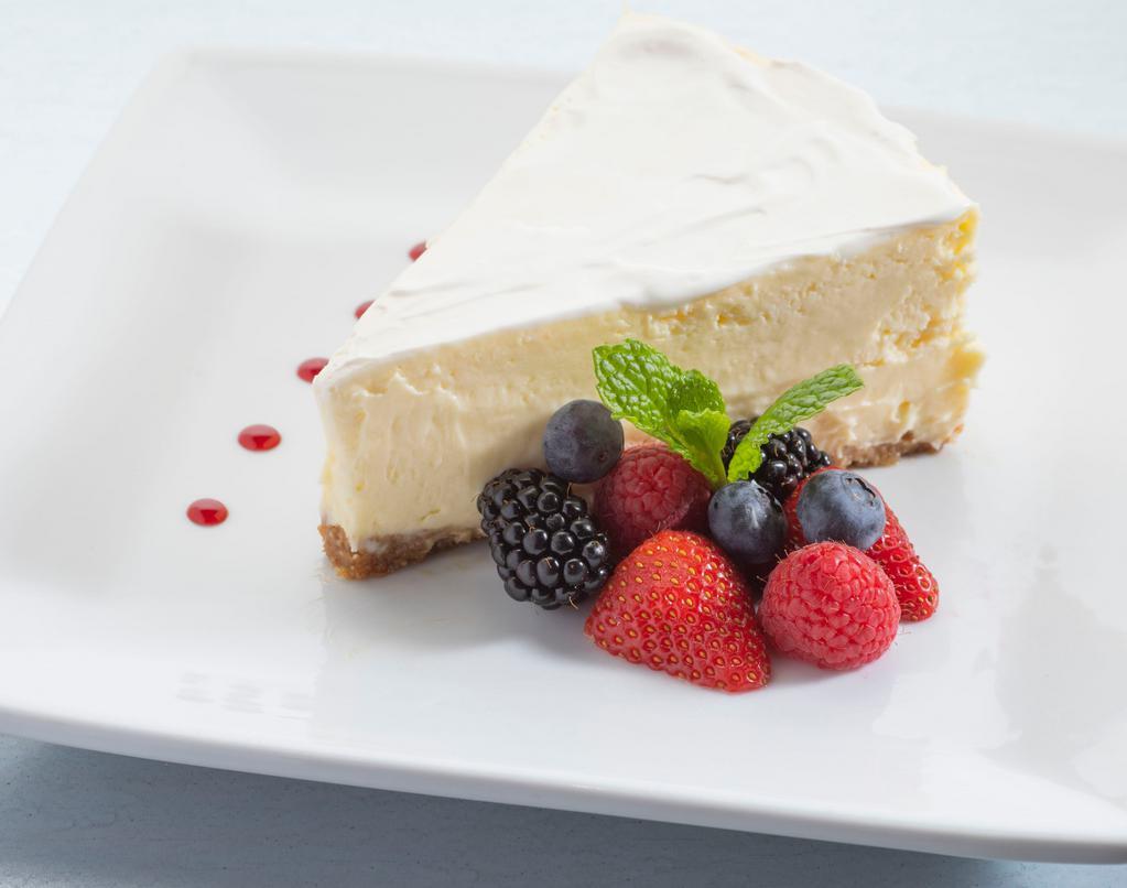 Cheesecake · Creamy homemade cheesecake served with fresh berries